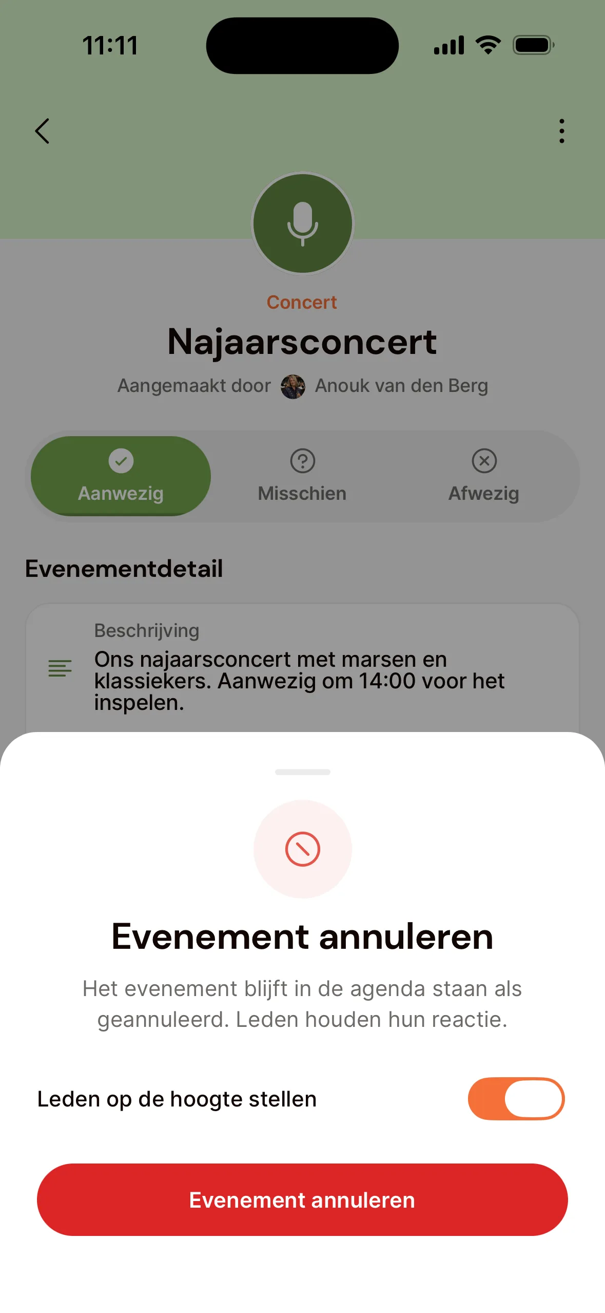 Een concert in de app met het venster Evenement annuleren: uitleg dat het evenement als geannuleerd in de agenda blijft, de schakelaar Leden op de hoogte stellen (aan) en de knop Evenement annuleren.